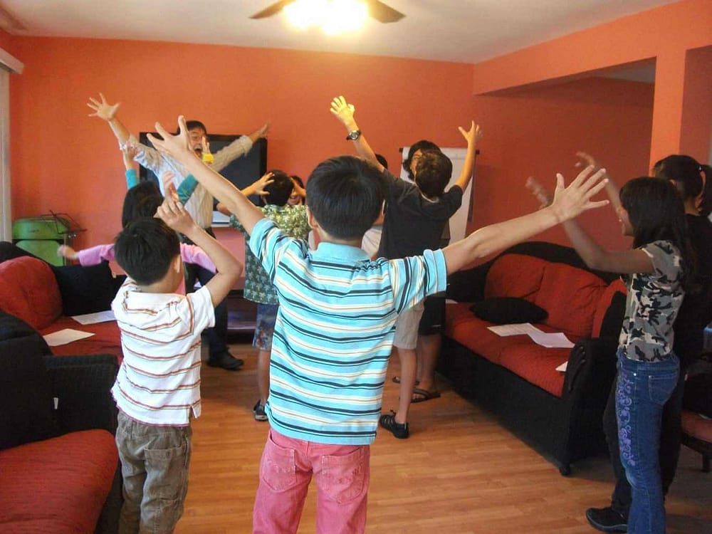 Kids Raising Hands